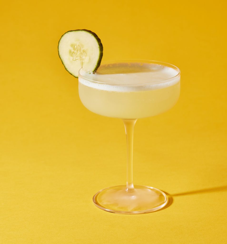 cocktail with cucumber garnish