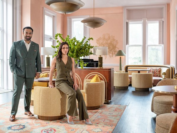 man and woman sitting in upscale hotel lounge