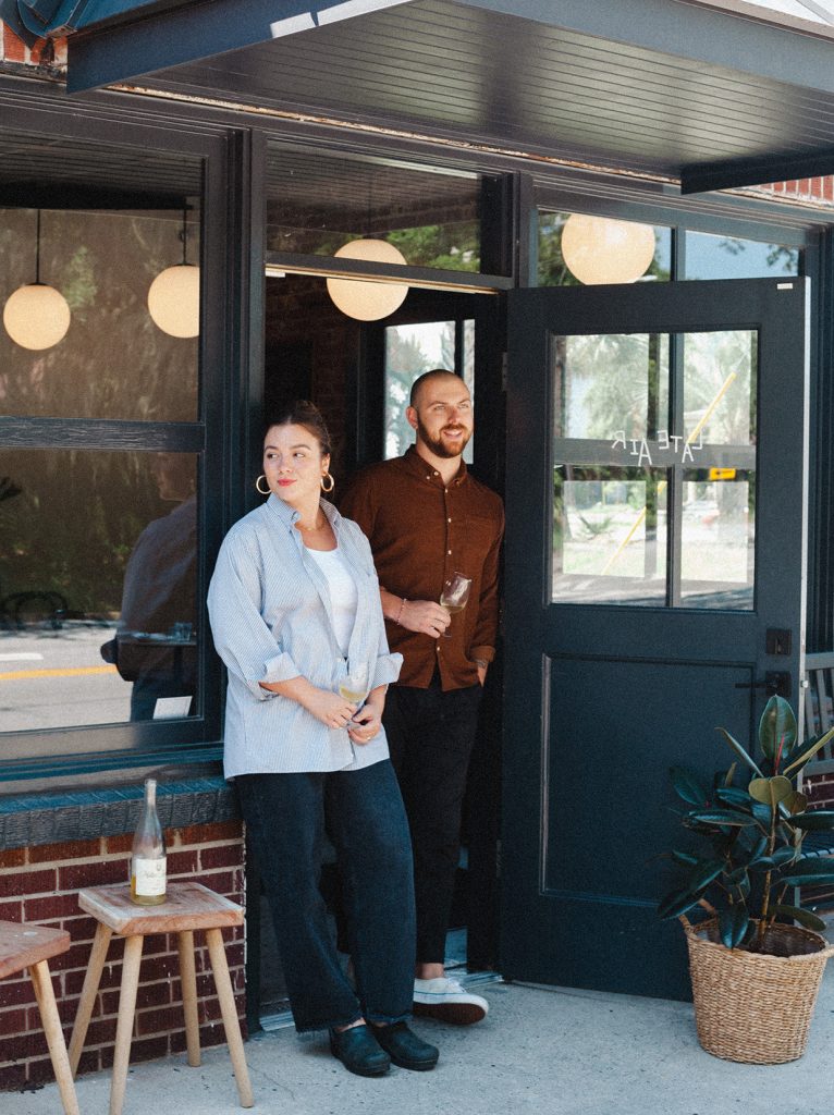 Couple standing in restaurant doorway of Best of Savannah honorable mention Late Air