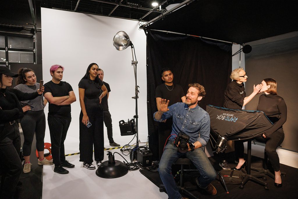 Group of art students in a photography studio