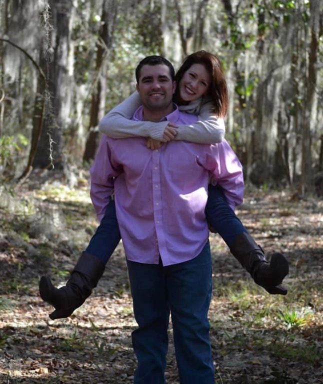 man giving a woman a piggyback ride