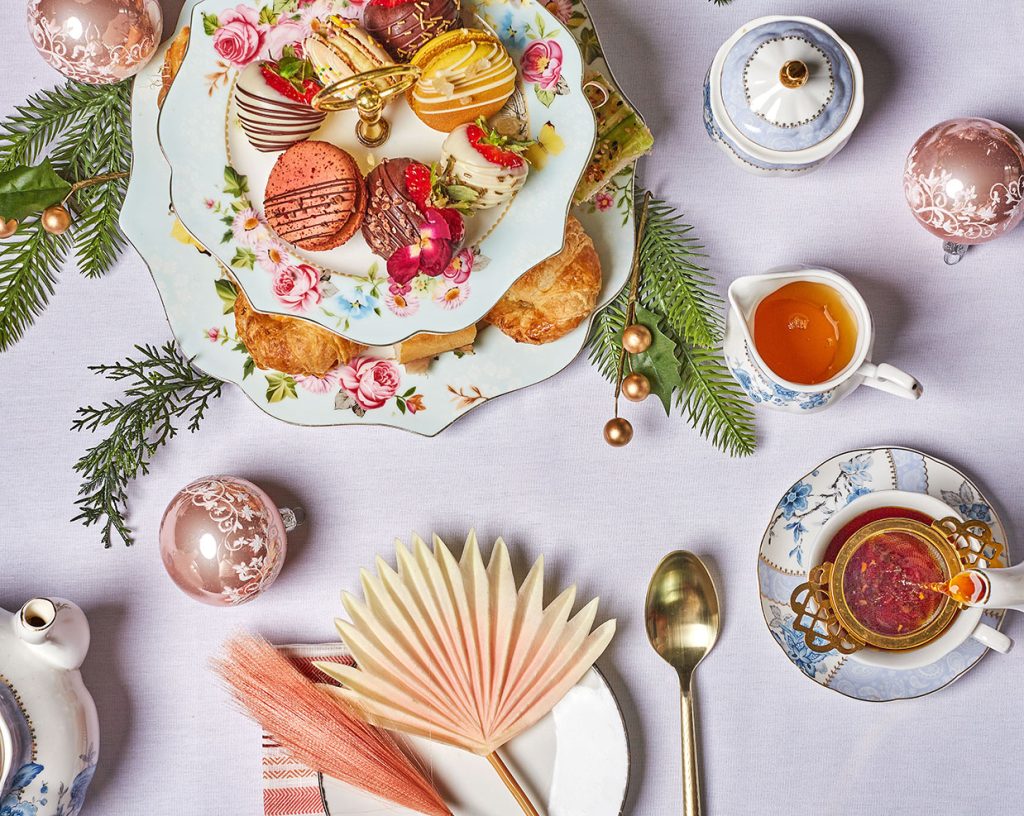 Tea service with evergreen sprigs and ornaments