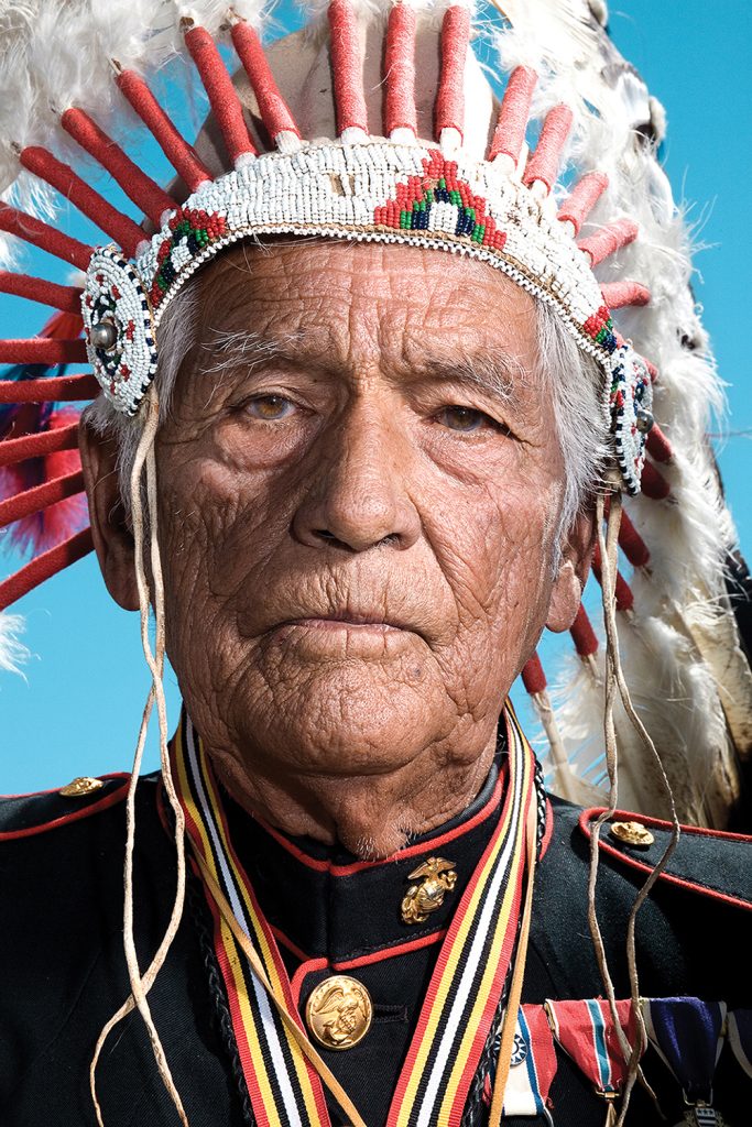 American Indian man in headdress