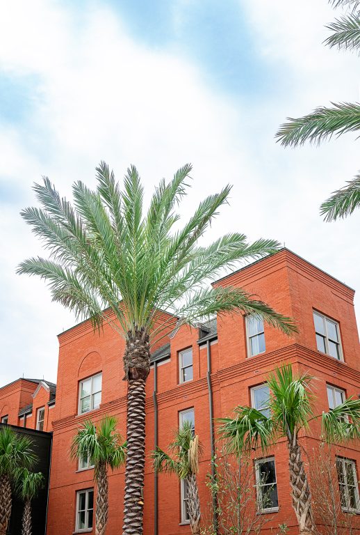 Red-brick exterior of Hotel Bardo