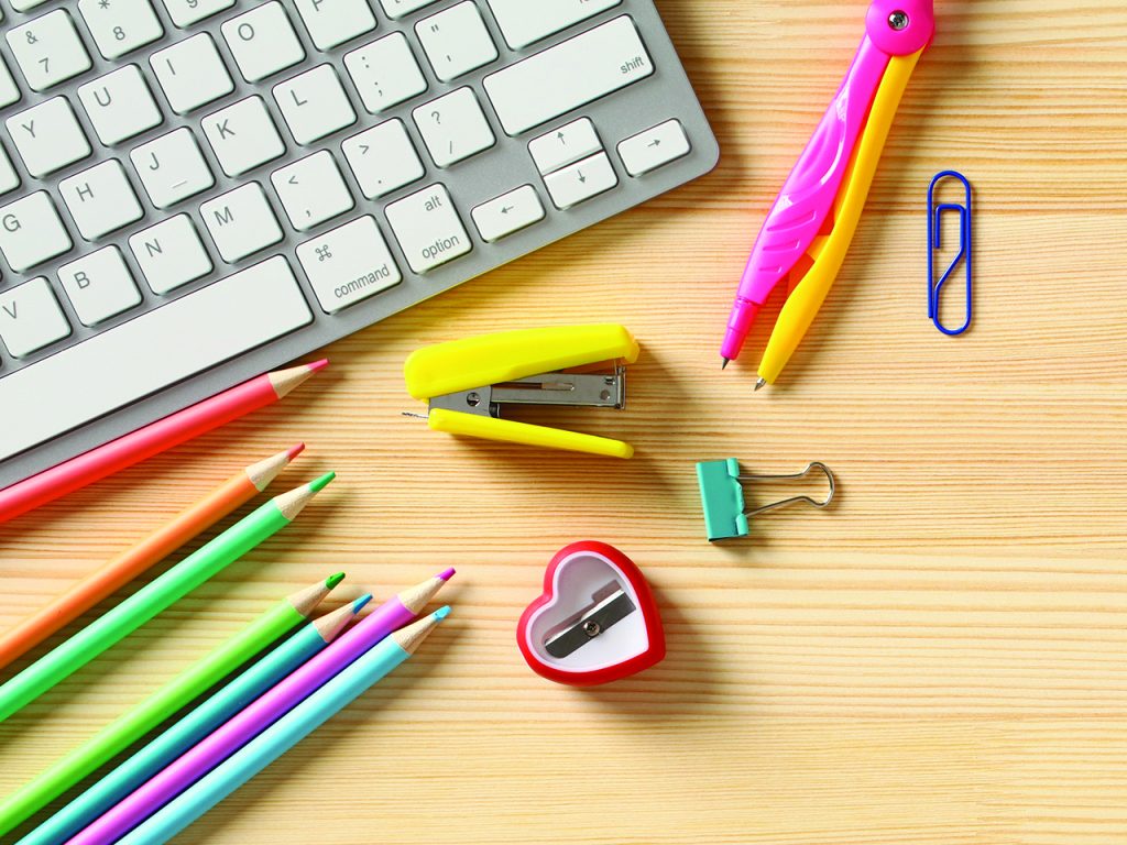 School supplies on wooden desk top