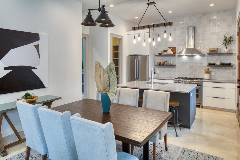 dining table and kitchen island with sink