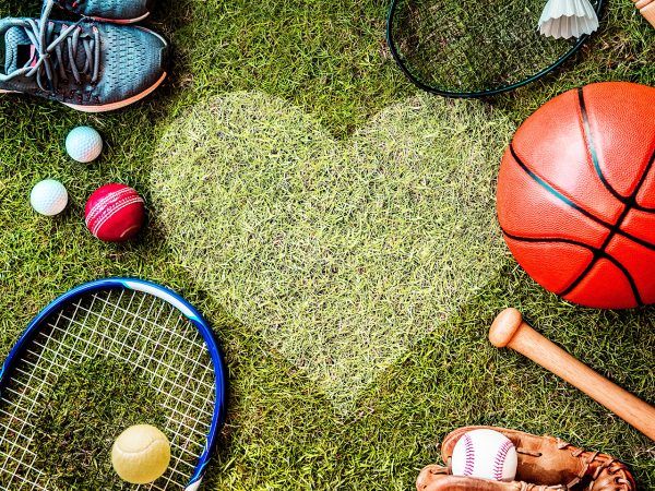 sporting equipment laying on the grass